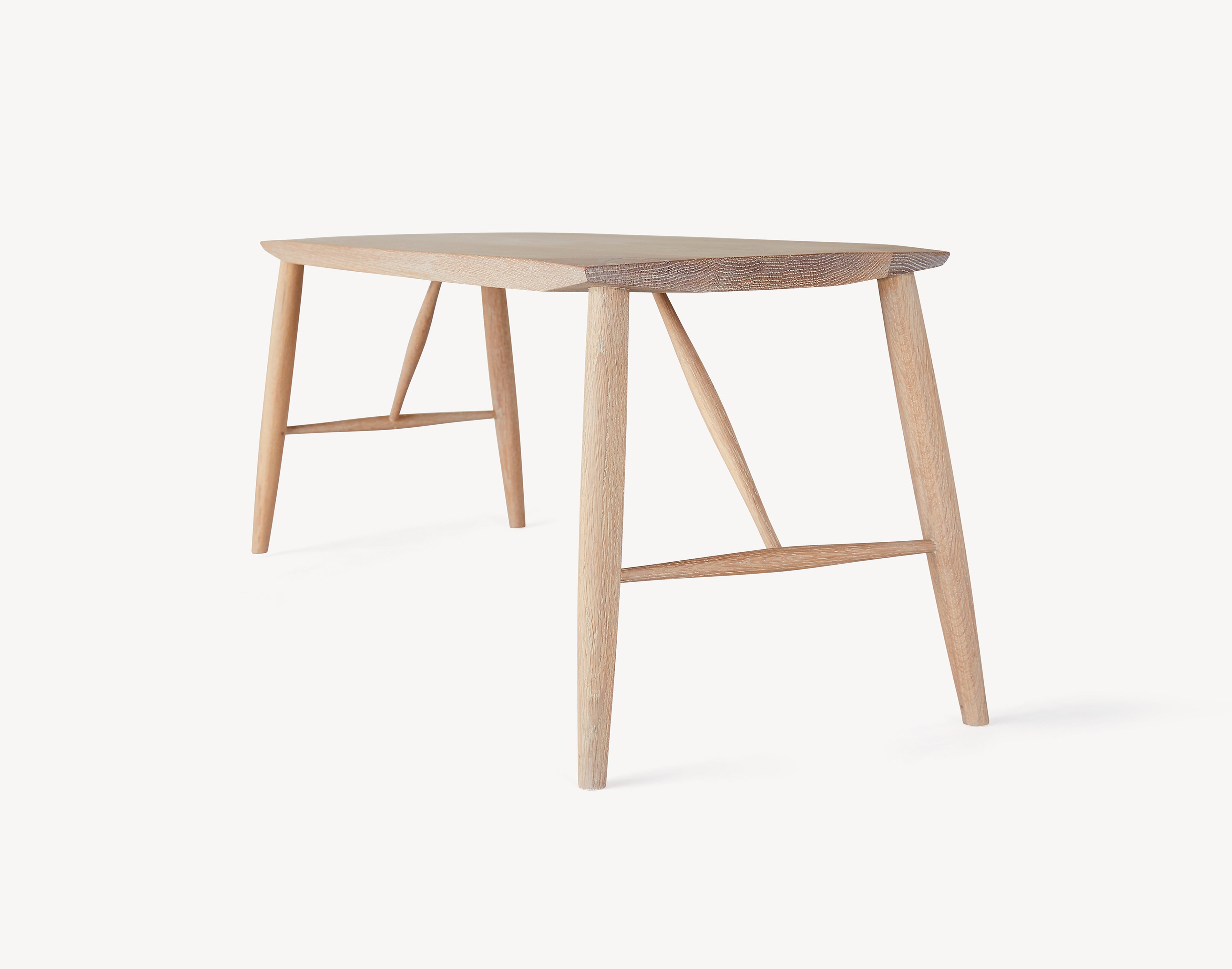minimal oak bench in light wood. three quarter view