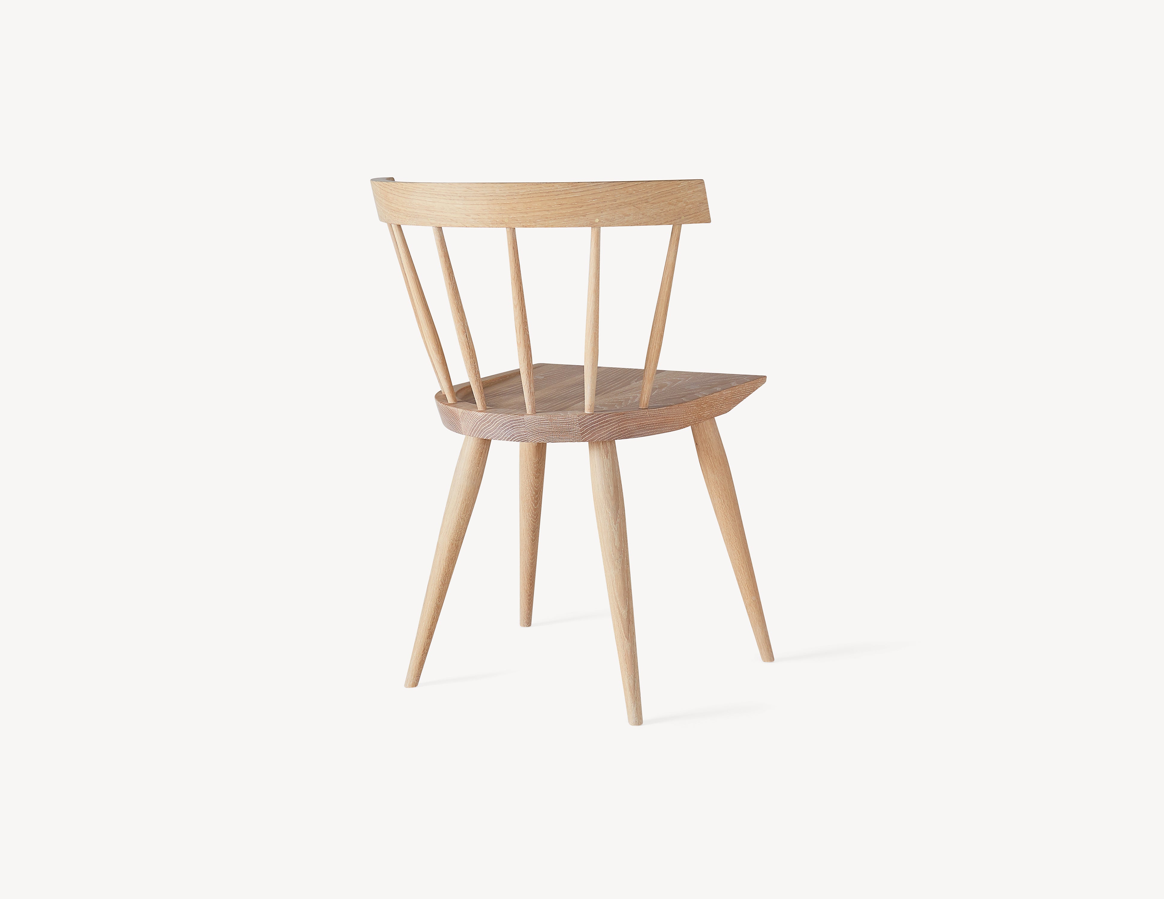rear view of minimal light white oak windsor dining chair.
