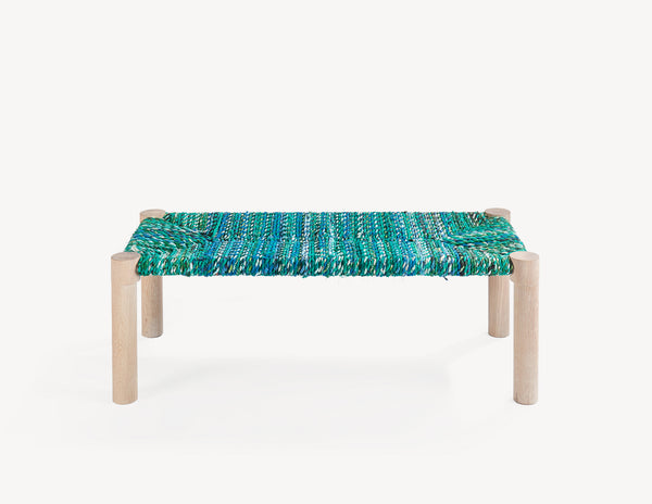 wooden bench with colorful woven seat.