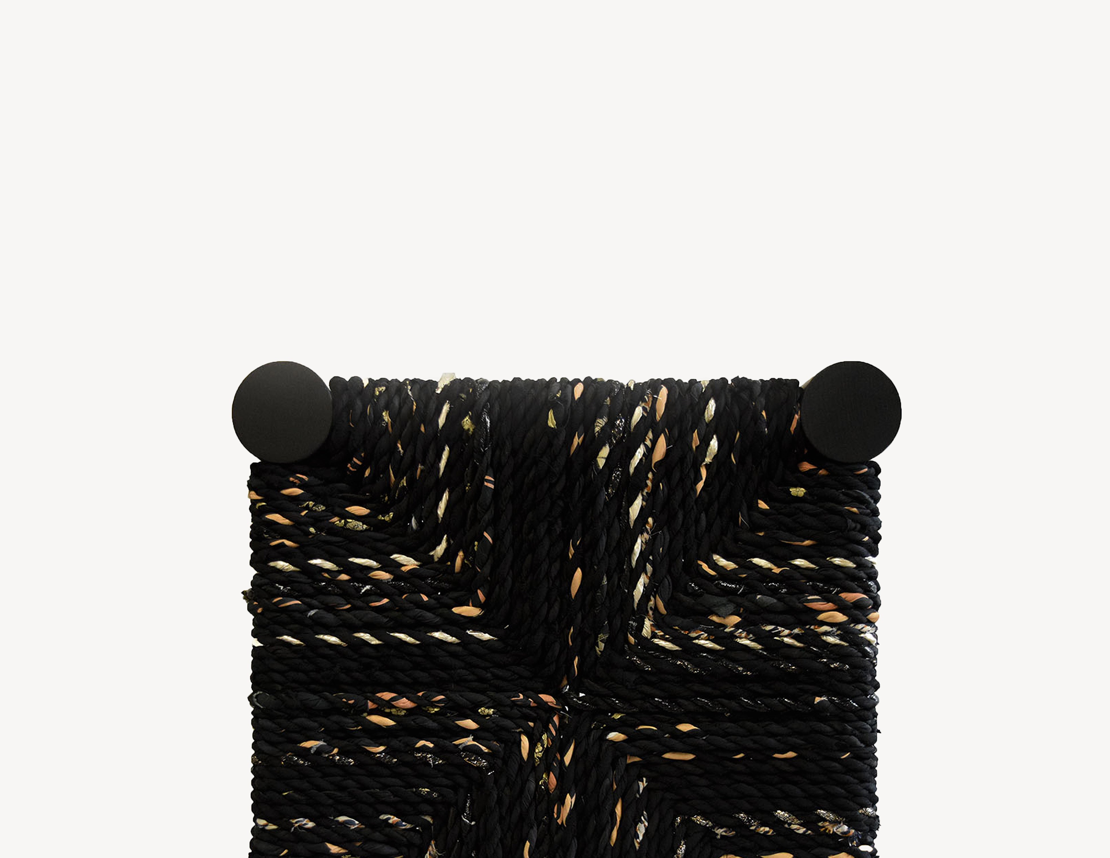 black wooden bench with black woven seat. top view.