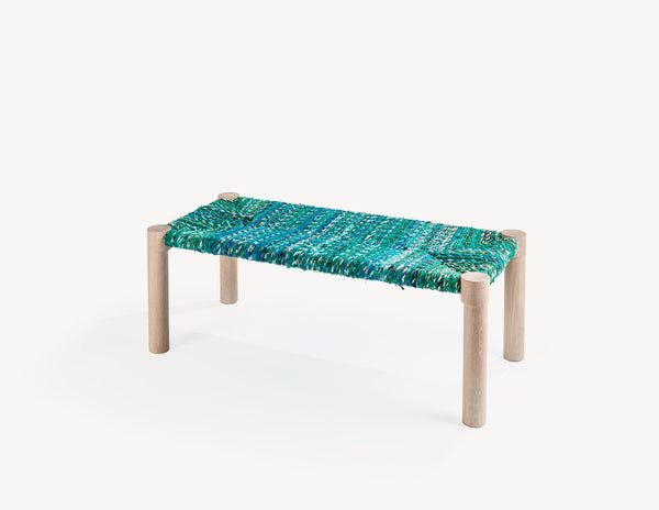 wooden bench with colorful woven seat.